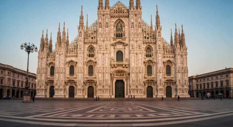 Duomo di Milano, Milan, Italy — symmetric composition, golden hour, minimal architectural study of marble façade and mosaic floor, 35mm film look, soft warm shadows, no people facing camera, slight le